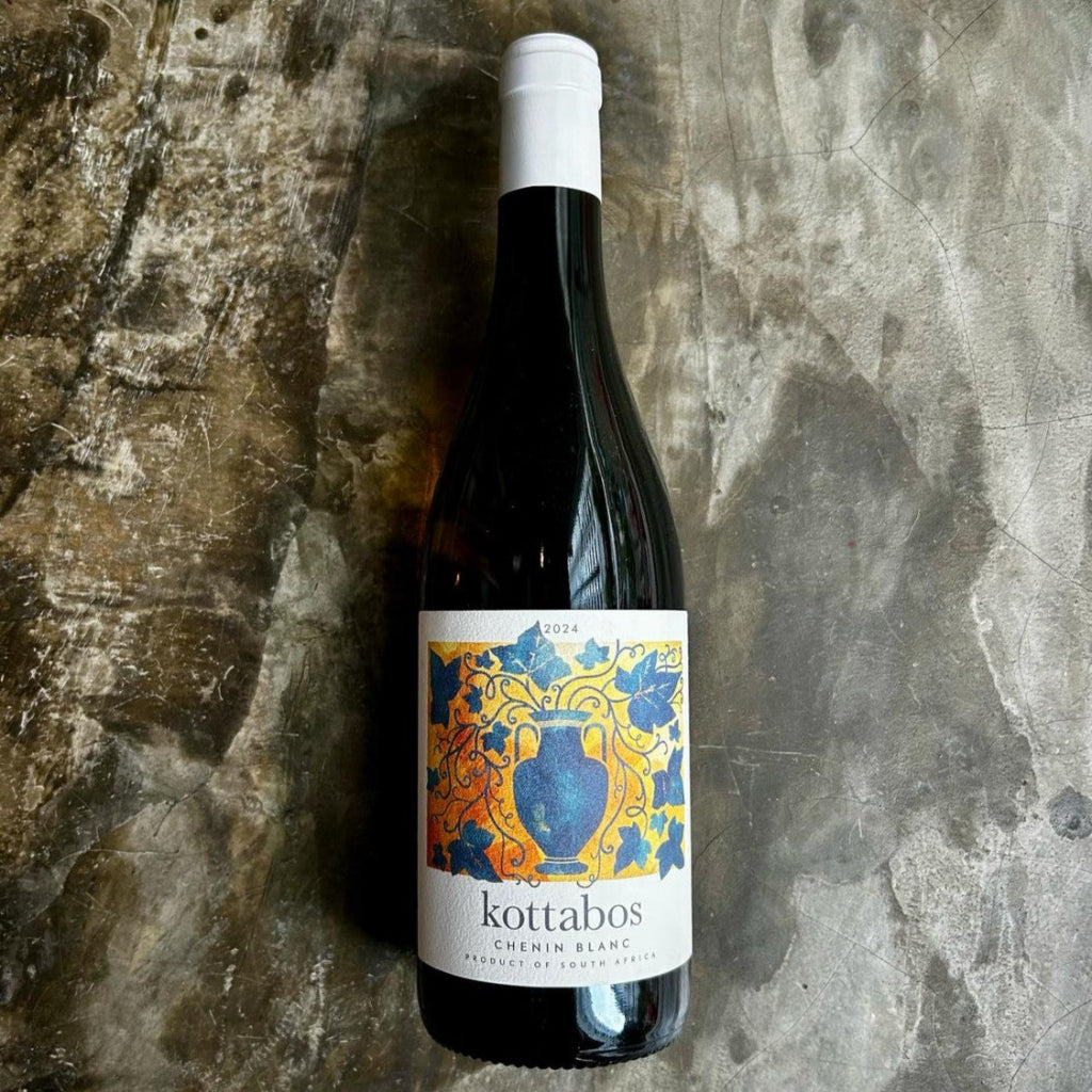 Kottabos Skin Contact Chenin Blanc on concrete floor
