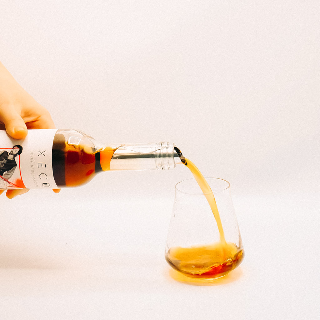 XECO Amontillado Pouring into glass Fortified Wine