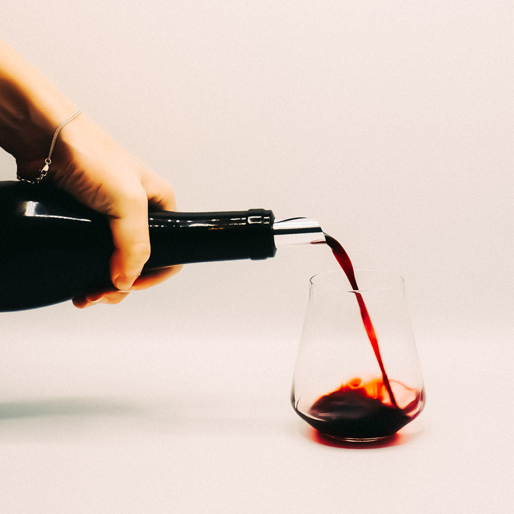 Guthrie Family Wines Archival Petit Sirah Pouring wine into glass Red Wine