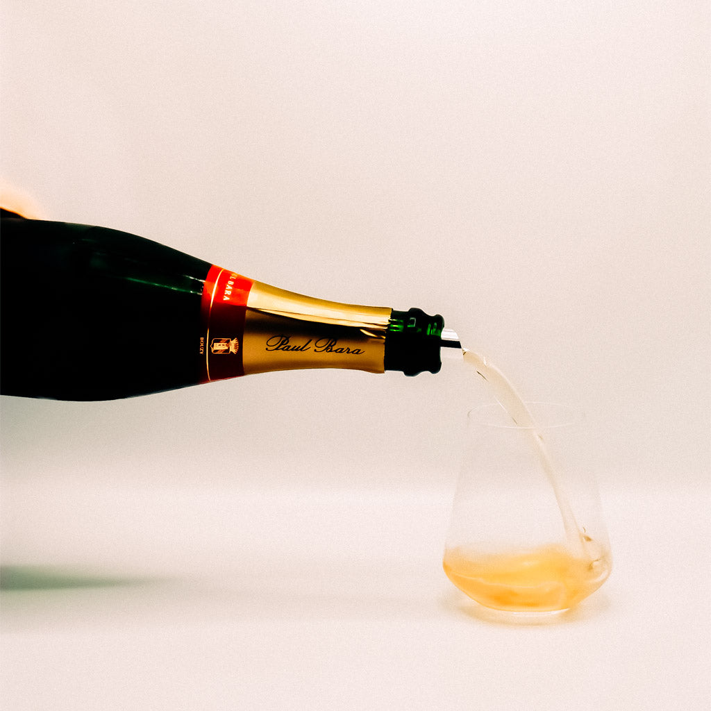 Champagne Paul Bara Grand Rose de Bouzy, Champagne, France, Sparkling Wine bottle Pouring into glass