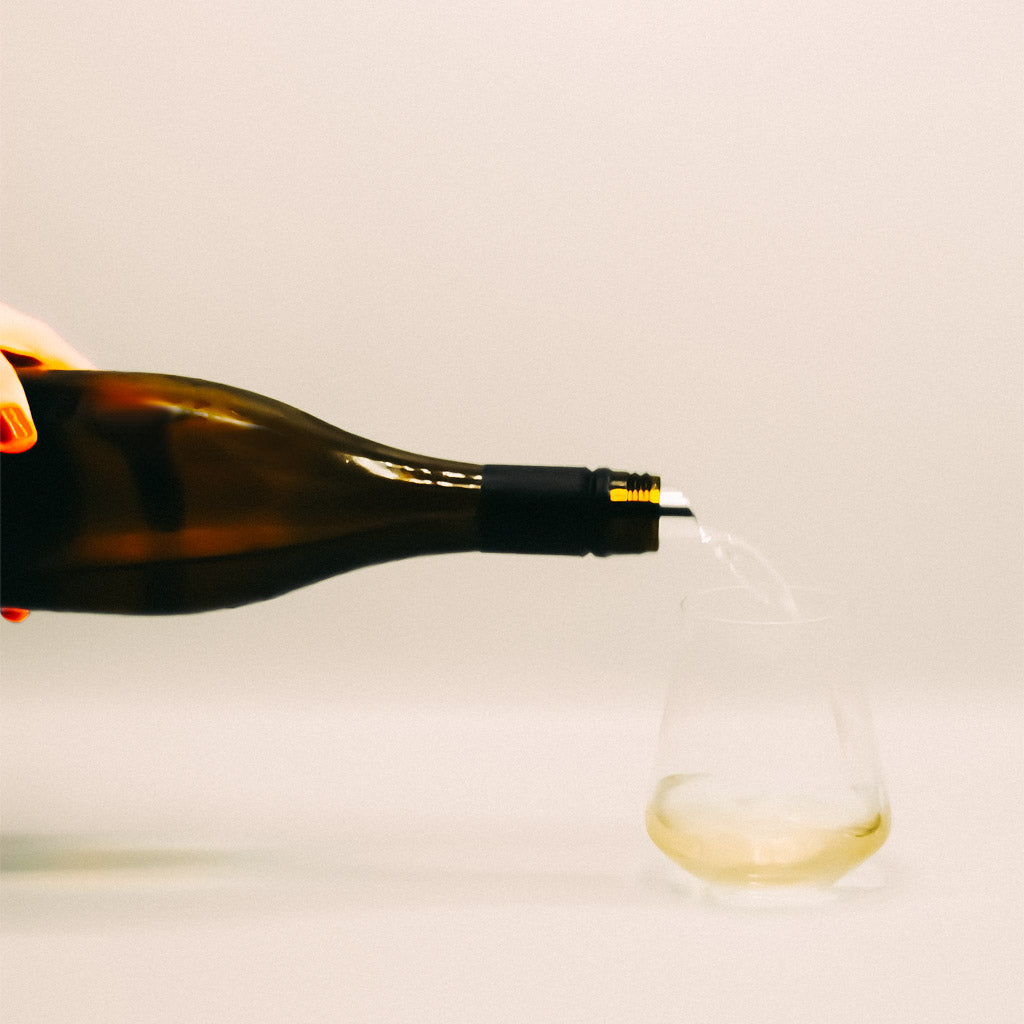Evolution Lucky 9 White Wine Bottle pouring into glass, Oregon, USA