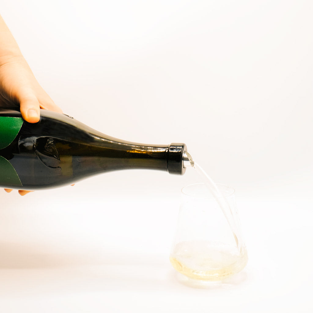 Follador Brut Prosecco Bottle pouring into glass, Sparkling Wine, Valdobbiadene, Italy