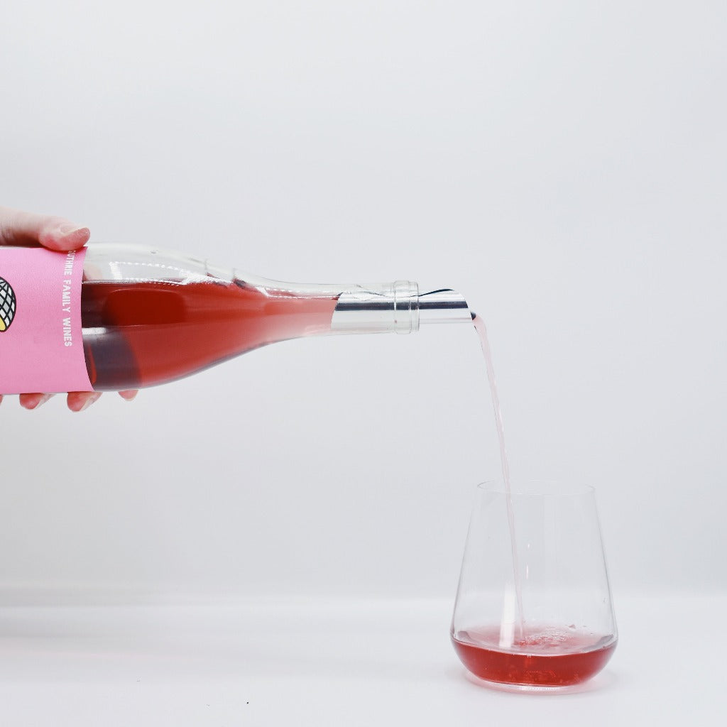 Guthrie Family Wines Kisses Viognier Pinot Noir, Napa Valley, USA, Pink Rose Wine bottle  Pouring into glass