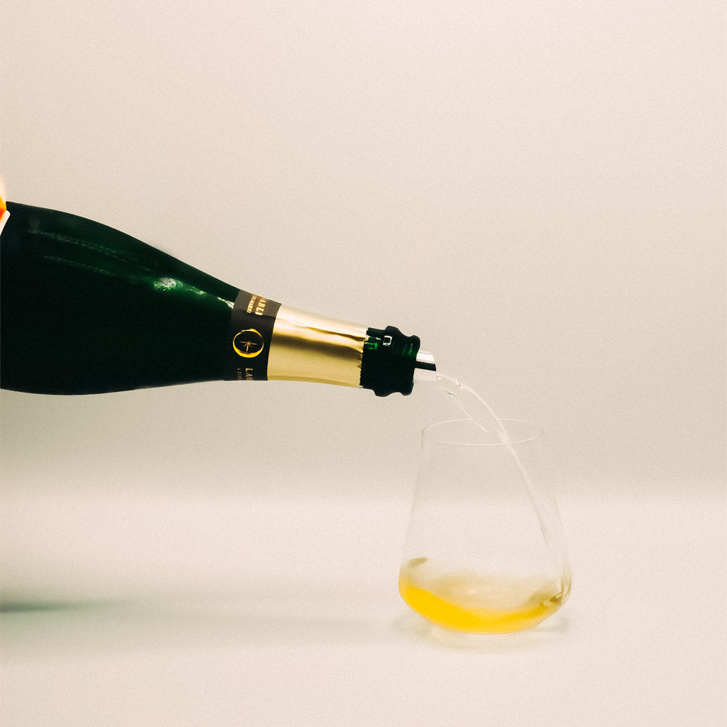 Champagne Lamiable Souffle d'Etoiles Extra Brut Champagne Bottle pouring into glass, Sparkling Wine, France