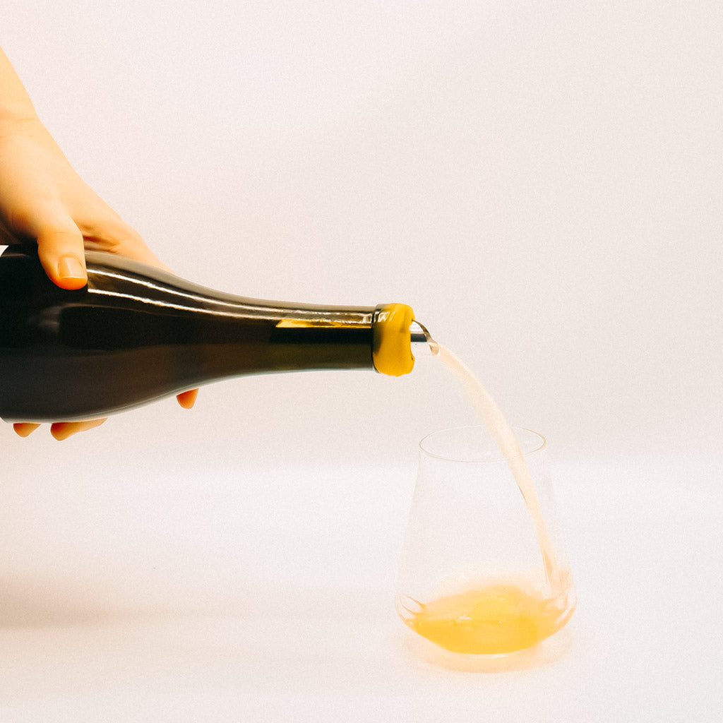 Millton Libiamo Field Blend, Gisborne, New Zealand, Orange Wine Bottle Pouring into glass