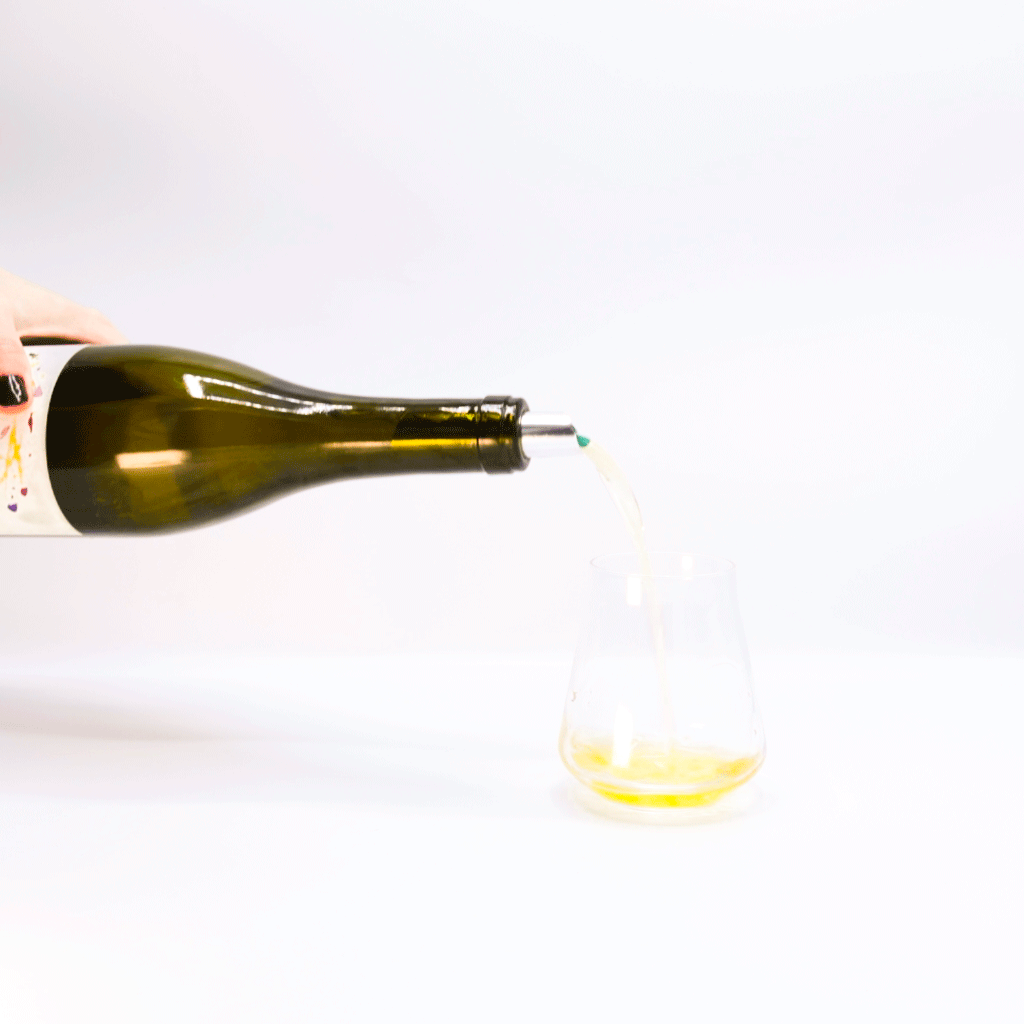 Millton Libiamo Amphora Ferment Chenin Blanc, Gisborne, New Zealand, White Wine Bottle Pouring into glass