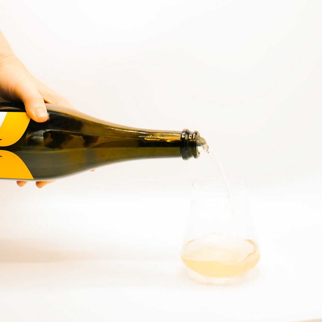 Follador Testardo Prosecco Bottle pouring into glass, Sparkling Wine, Valdobbiadene, Italy