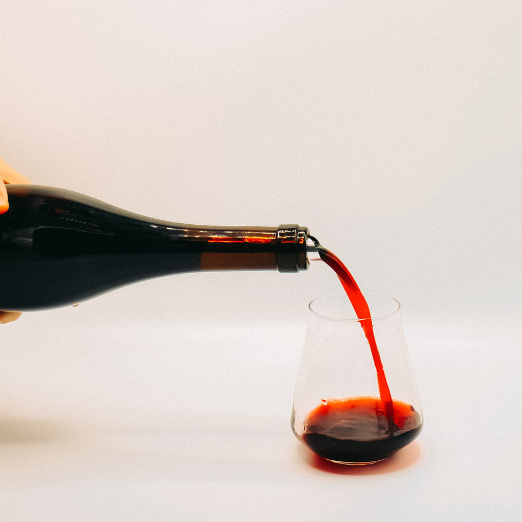 Unico Zelo Truffle Hound Red Wine Blend Bottle pouring into glass, Australia